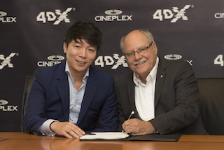 Brandon Choi, CEO of CJ 4DPlex America, left, with Ellis Jacob, president and CEO, Cineplex.
