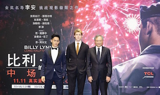 Left to right, Billy Lynn actors Mason Lee and Joe Alwyn and director Ang Lee.