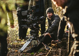 Cinematographer Wes Johnson on location for Instrument of War. Photo by Luke Salnas.