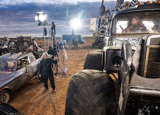 Pictured, from left to right, are Anya Taylor-Joy, director George Miller and Chris Hemsworth on the set of Warner Bros. Pictures’ and Village Roadshow Pictures’ action adventure Furiosa: A Mad Max Saga, a Warner Bros. Pictures release. Photo by Jasin Boland. 