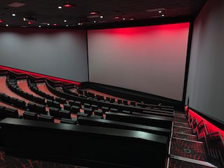 Although the existing room had the basic shape of an amphitheatre, a great deal of work was needed to make it a modern movie theatre.
