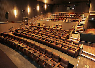 An empty Cinemark auditorium. Cinemark is a major Barco customer.