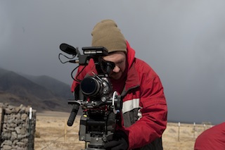 Joel Stout checking a shot. Weather extremes and dust were a big challenge on the shoot.