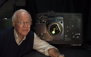 Douglas Trumbull with a Christie Mirage 4K35 laser projector.