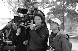 Cinematographer Johan-Fredrik, with the camera, and AC Jens Patterson, in the white hat, on set.