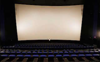 There are two auditoriums with screens that are 90 feet wide.