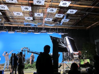 The decision to shoot on a set was a function of the low budget.