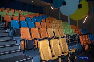 It also has a kids’ theatre designed to give families and children a totally new experience. It includes seats in different colors and a slide that connects with a playroom at the back of the theatre.