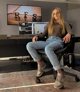 Born in Venezuela and raised in Minnesota, Erika Koski’s dream of being a competitive gymnast unfortunately ended due to multiple injuries throughout her childhood. However, besides being a gifted athlete, Koski was also a musician. Her love of music allowed her to pivot to a career in professional audio production.
