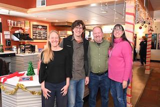 Pictured, left to right, Azriel LaMarca, Michael LaMarca, Brian Young and Katherine Young in the lobby at Sutton Cinemas in Grass Valley.